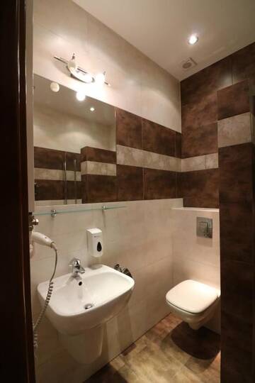 Фото номера Двухместный номер с 2 отдельными кроватями Отель Hotel Marzanna г. Niedrzwica Kościelna 24